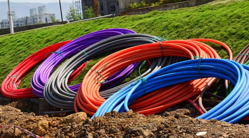 conduit, pipes, coils, rolls, colours, digging, earth, underground, laying, fibre, optical, communication, red, blue, grey, purple, conduit, conduit, conduit, conduit, conduit, digging, digging, digging
